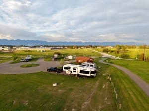 Aerial overview of Montana Basecamp RV Resort near Kalispell Montana with spacious RV sites and mountain views