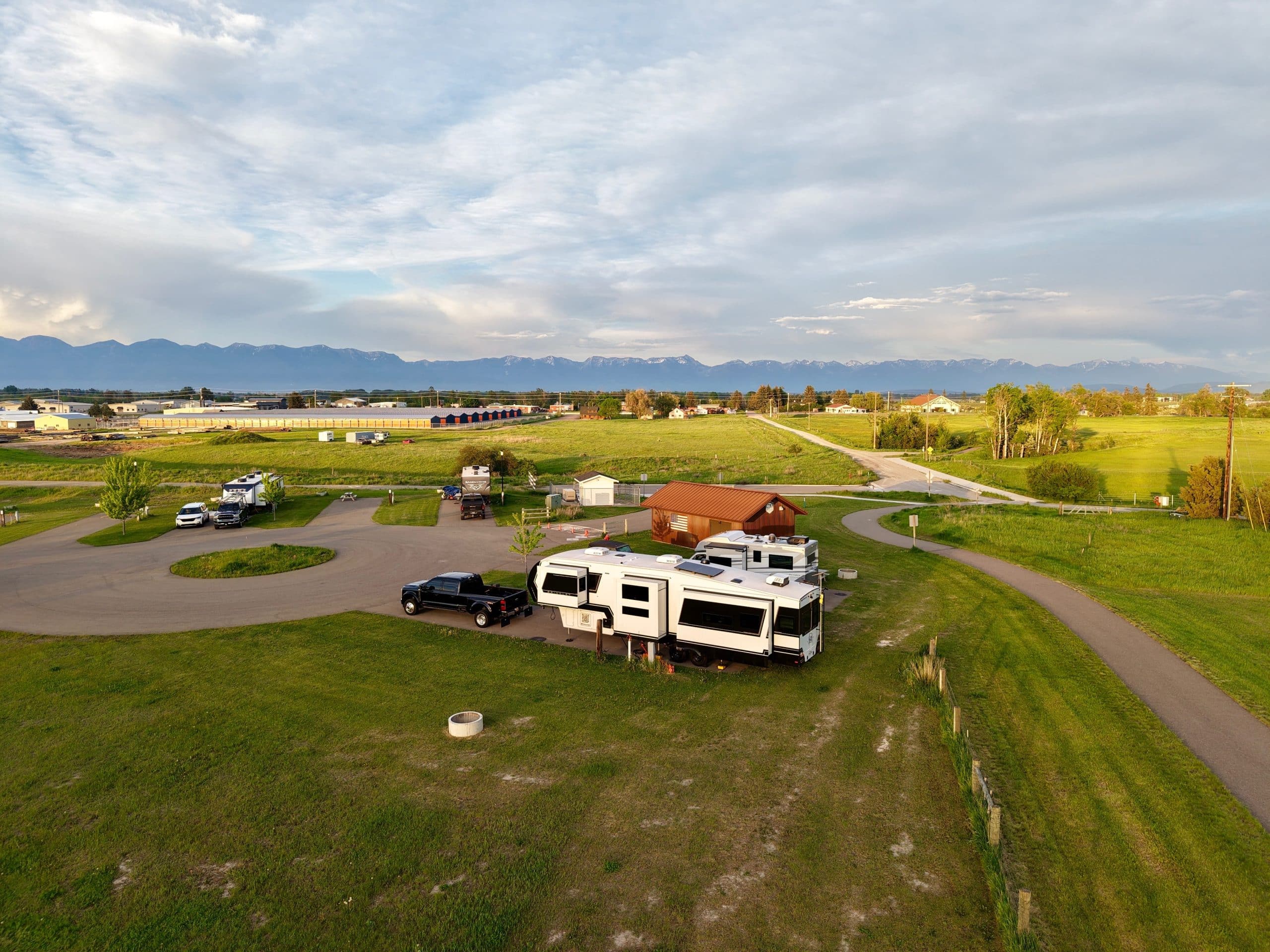 Aerial overview of Montana Basecamp RV Resort near Kalispell Montana with spacious RV sites and mountain views